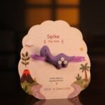 Nenolo Purple Dinosaur Rakhi for Kids with Kwwpsake Keychain